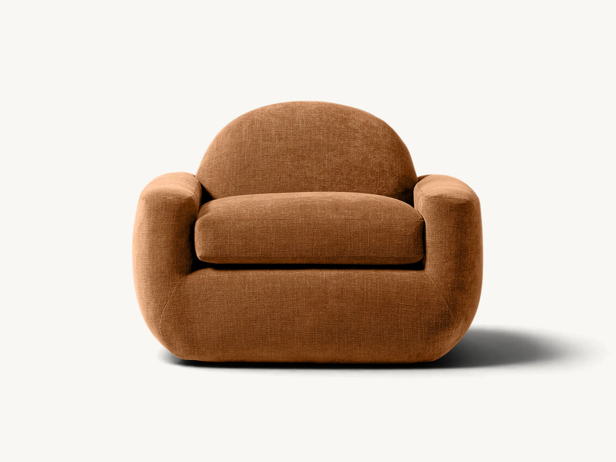 Fully upholstered accent armchair with rounded arch backrest in warm terracotta brown fabric