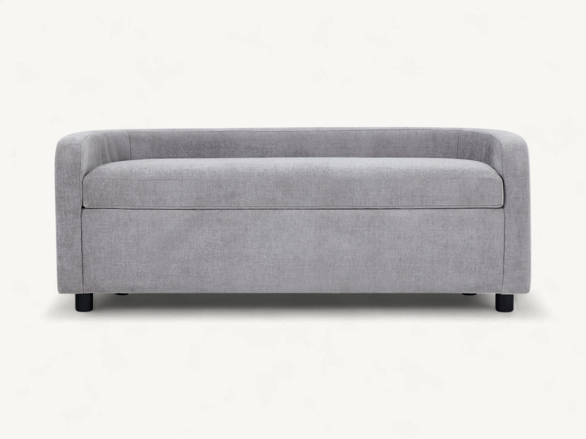 Grey upholstered storage bench with curved arms and a lift-top seat showing a hollow interior for storage.