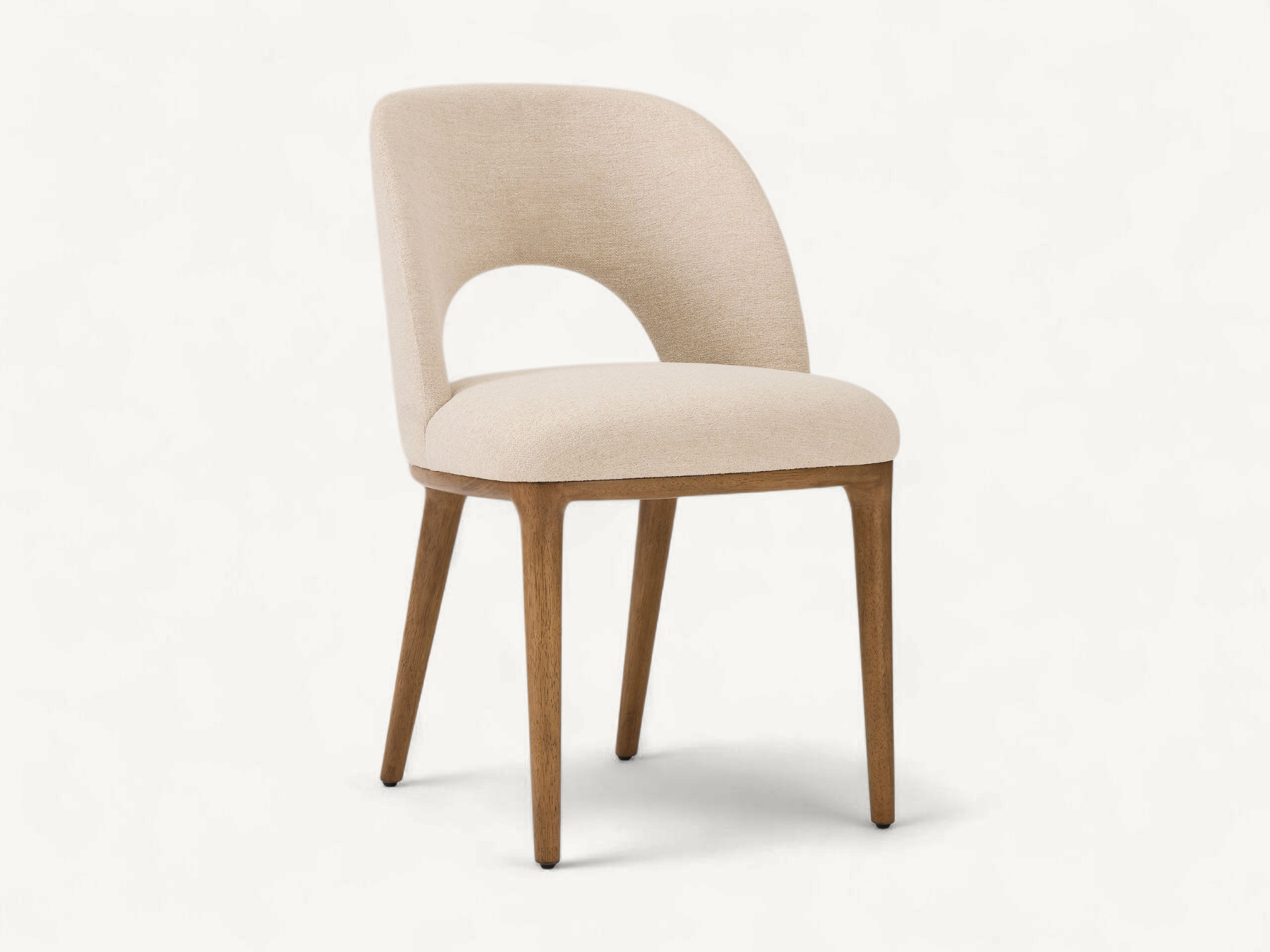Mid-Century Modern teak dining chair with cream upholstery and curved cut-out backrest.