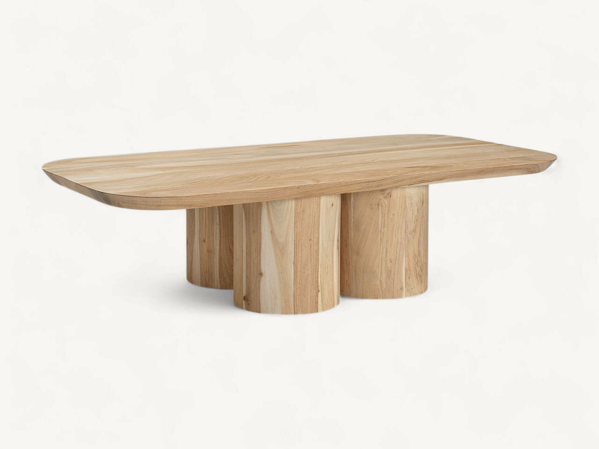 Natural teak wood coffee table with rounded rectangular top and three chunky cylindrical pillar legs on a white background.