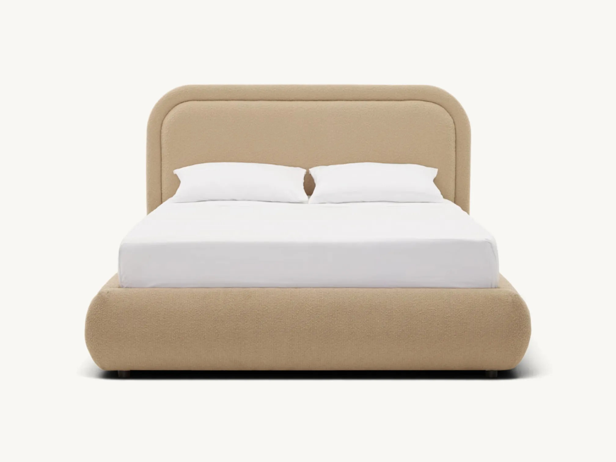 Low-profile upholstered platform bed frame in warm beige textured fabric with a rounded headboard
