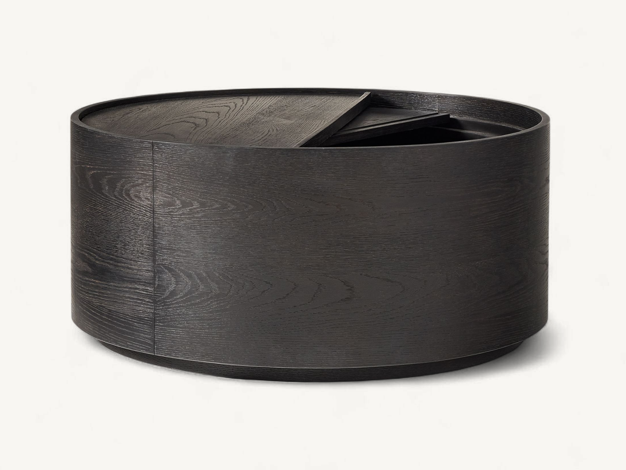 Modern round teak coffee table with hidden sliding storage compartment and natural wood grain finish.