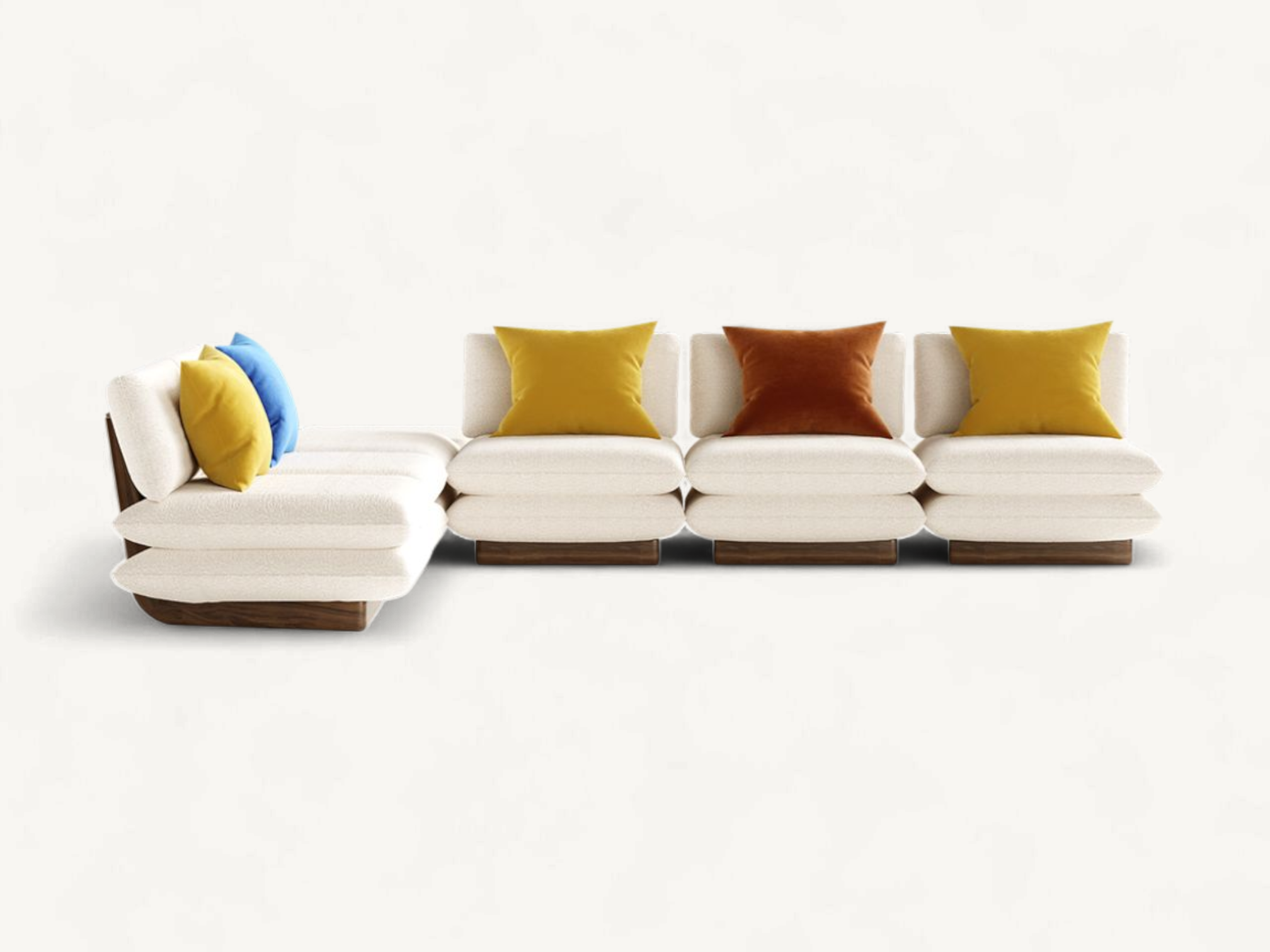 Mid-century modern modular sofa with curved walnut wood back panels, white cream upholstery, and colorful accent cushions.