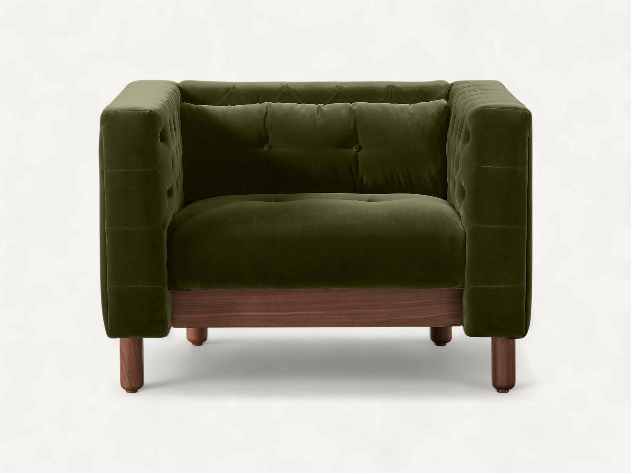 Mid-century style armchair with olive green velvet tufted upholstery and natural teak wood legs on a plain white background.