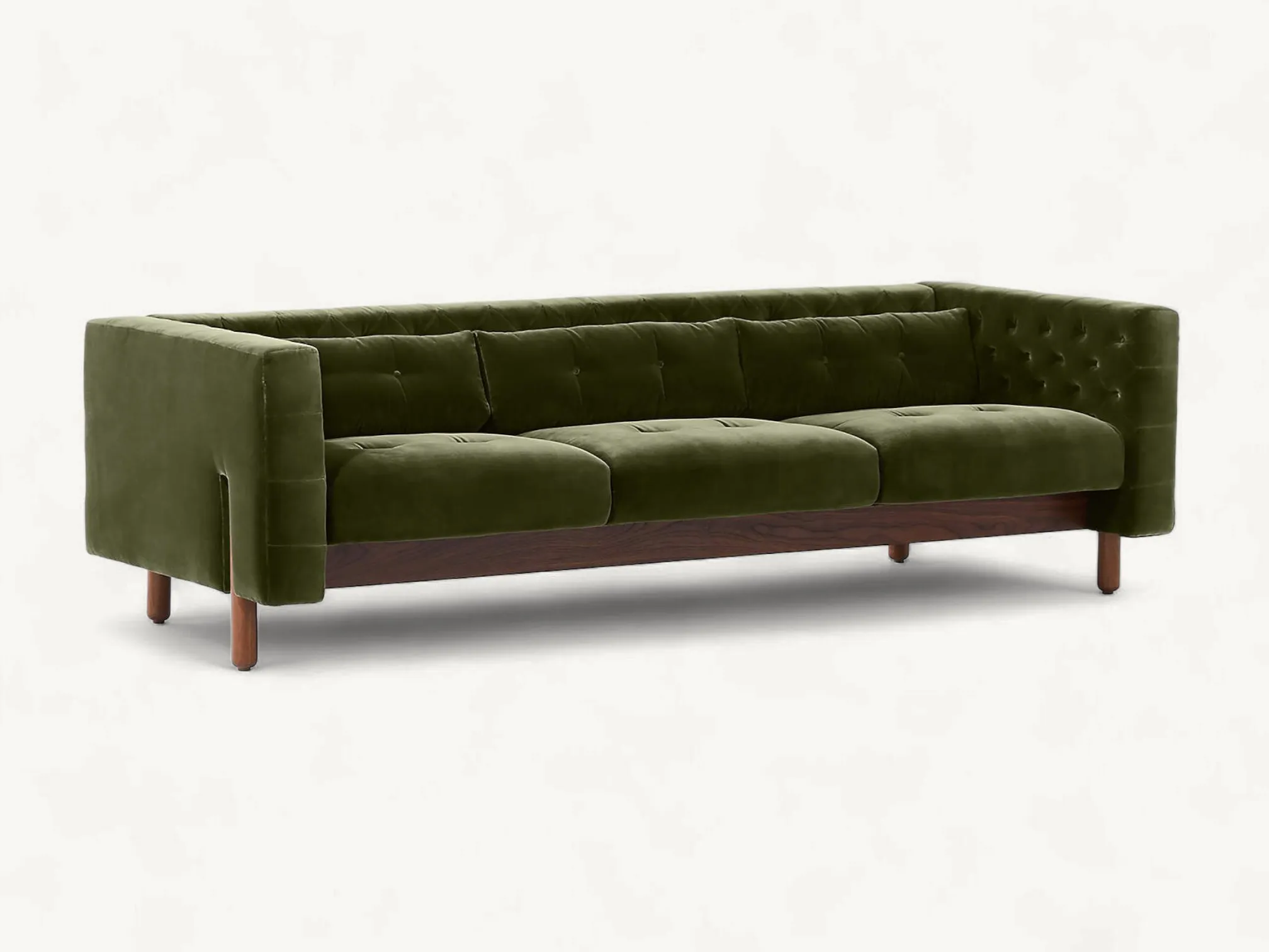 Mid-century style olive green velvet sofa with button tufting and tapered teak wood legs.