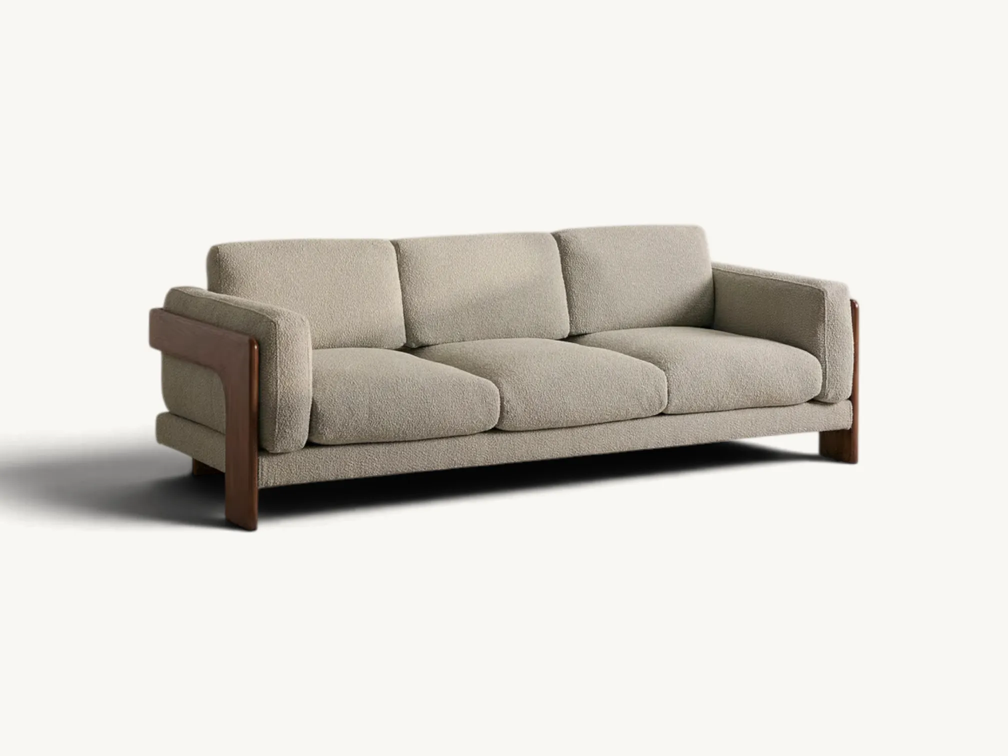 Mid-century modern 3-seater sofa with solid teak wood frame and textured cream upholstery.