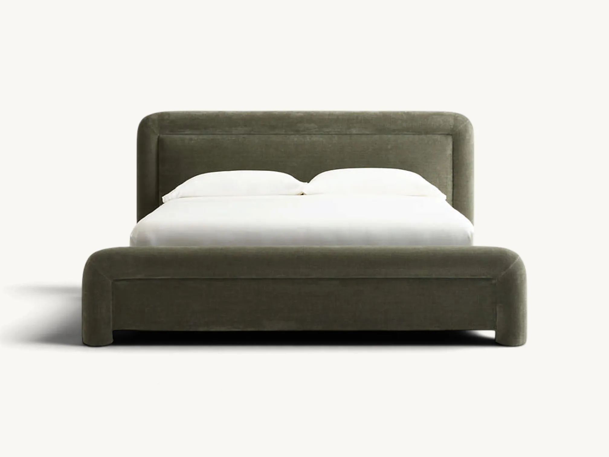 Fully upholstered olive green bed frame with thick rounded edges, a padded headboard, and soft textured fabric in a modern bedroom setting