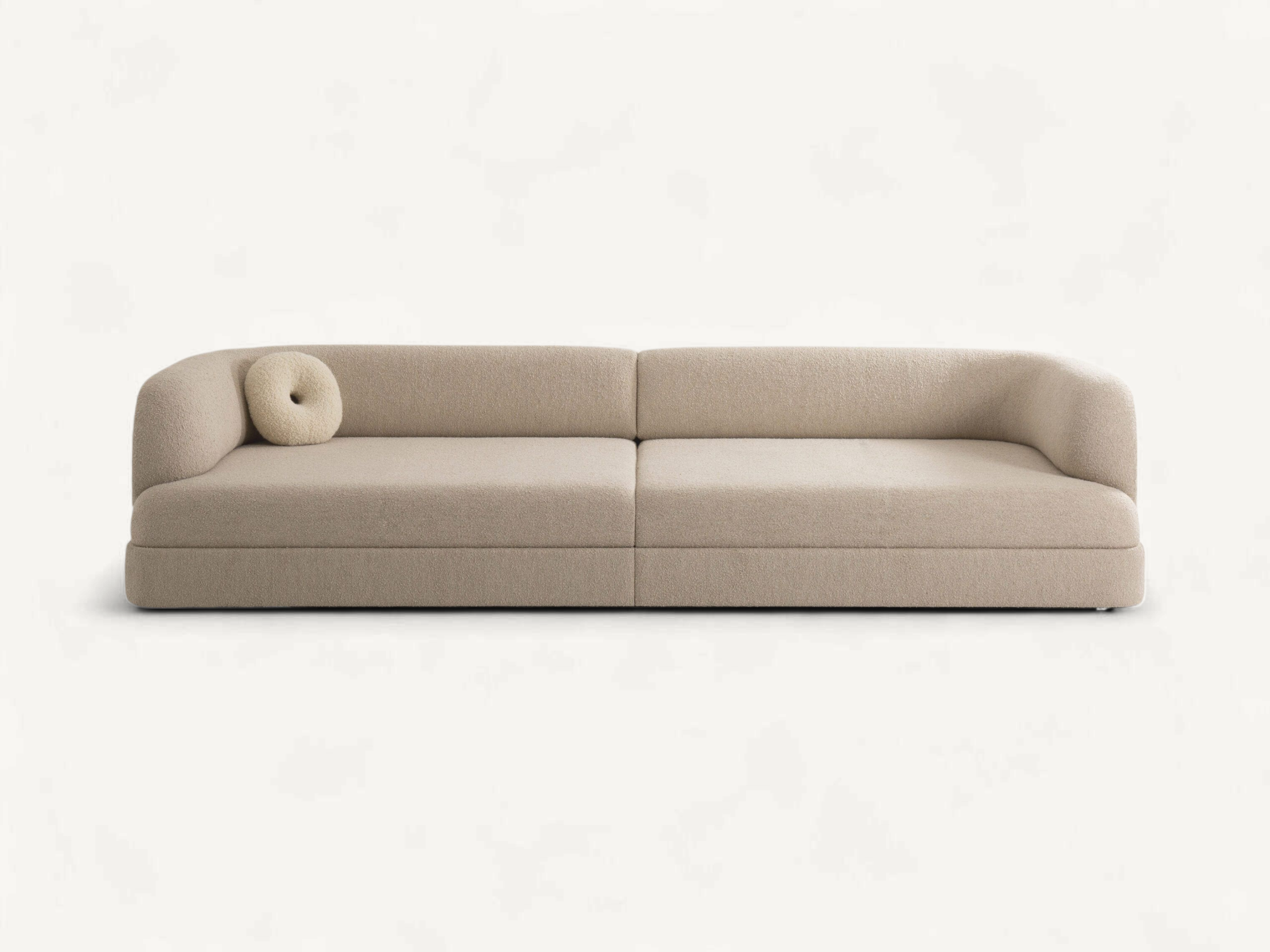 Modern Japandi style 2-seater sofa in beige bouclé fabric with curved armrests and low-profile minimalist design.