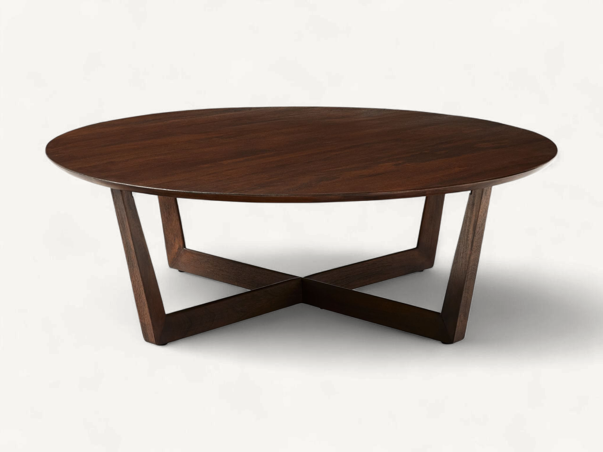 Modern round coffee table made of dark-stained solid teak wood with a geometric X-shaped base.