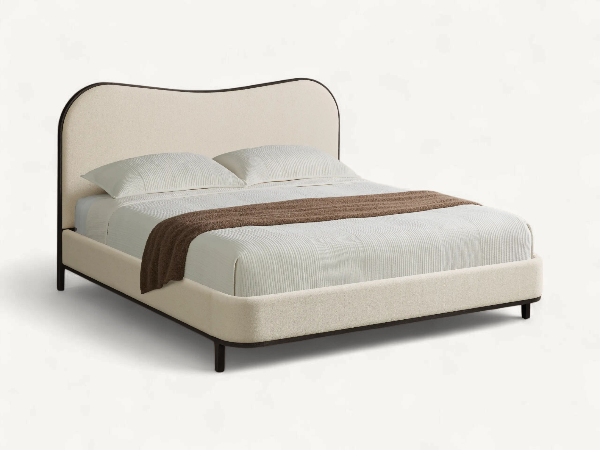 Modern upholstered bed frame with wavy contoured headboard, dark teak wood trim, slim legs, and minimalist cream fabric design.