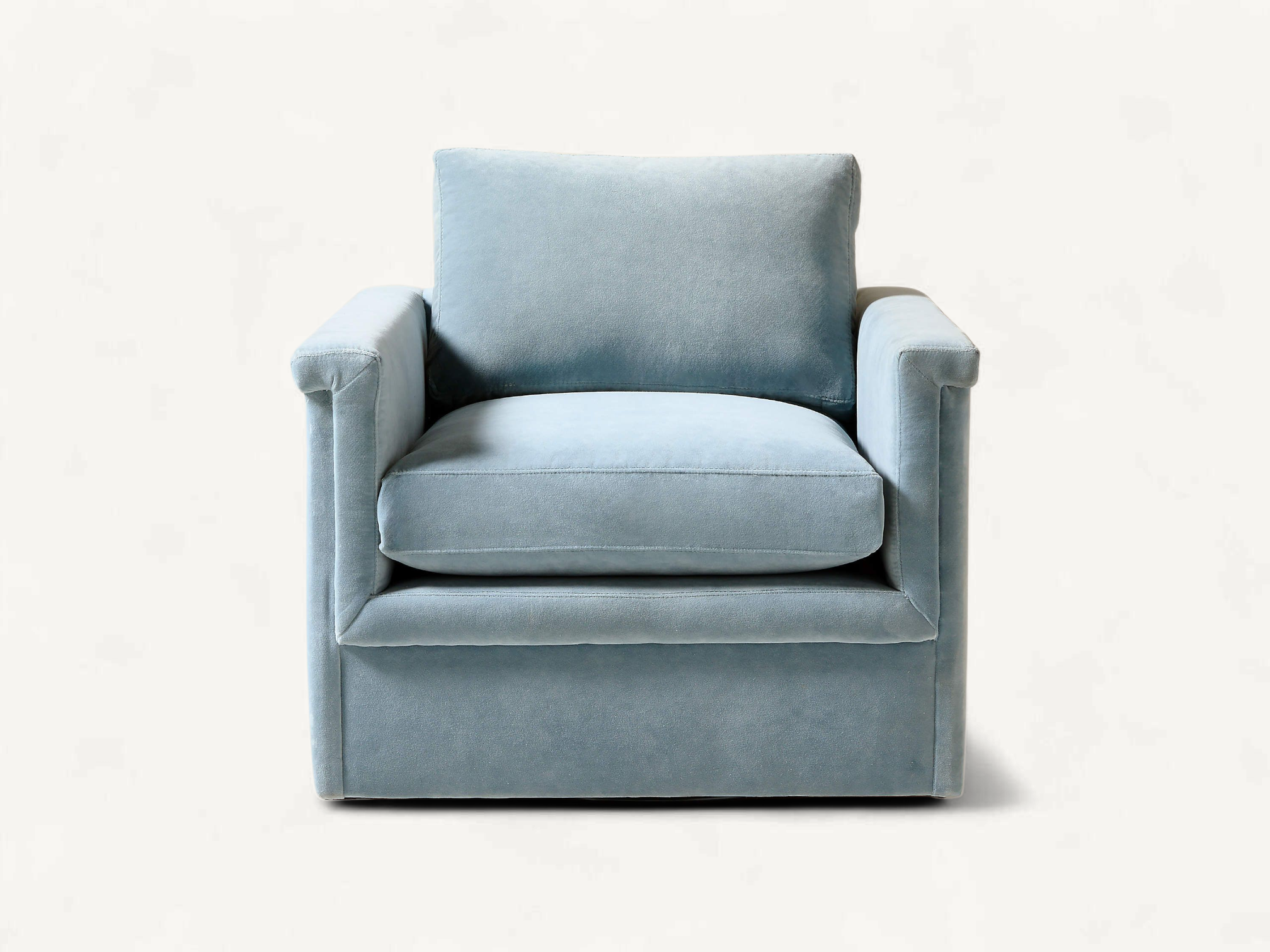 Light blue velvet single armchair with a clean rectangular design and plush cushions on a plain white background.