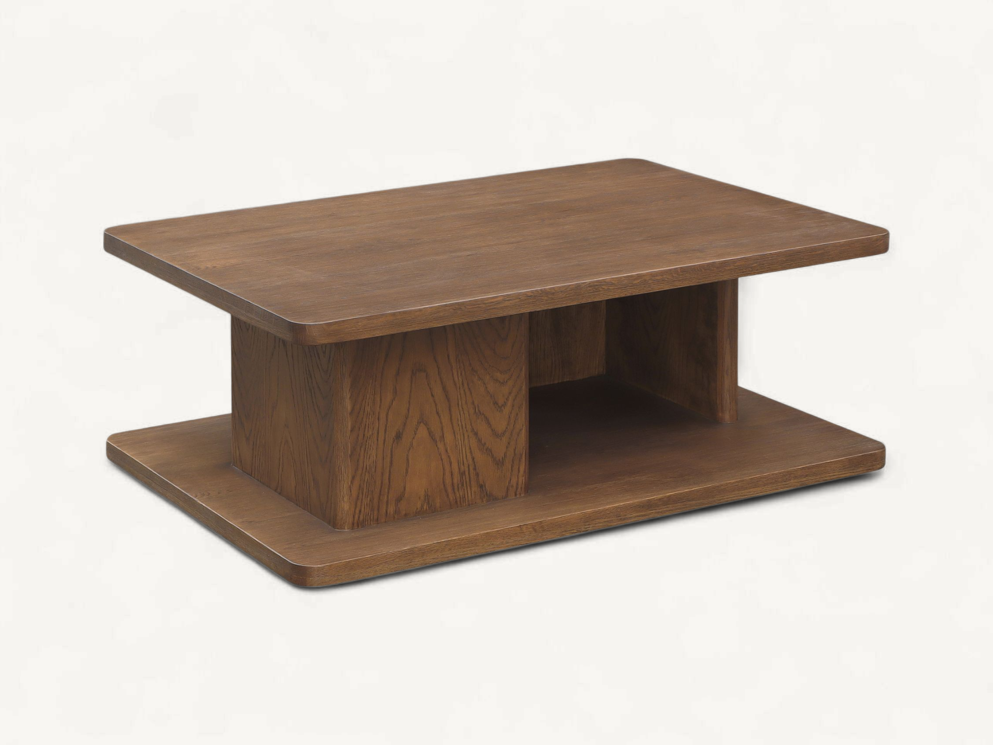 Modern tiered teak wood coffee table with a central block pedestal and open side storage compartments on a white background.